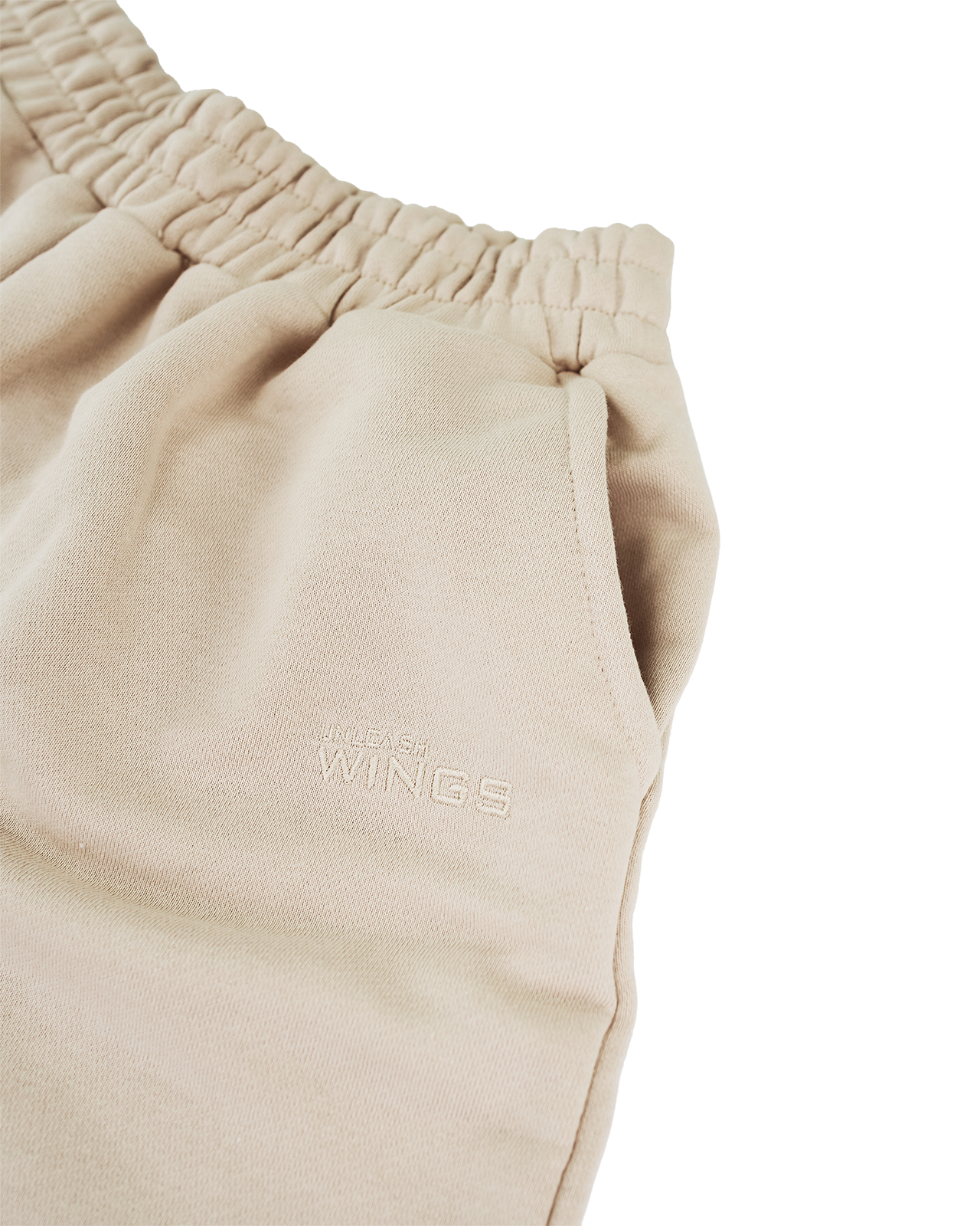Damskie szorty dresowe UNLEASH WINGS BEIGE