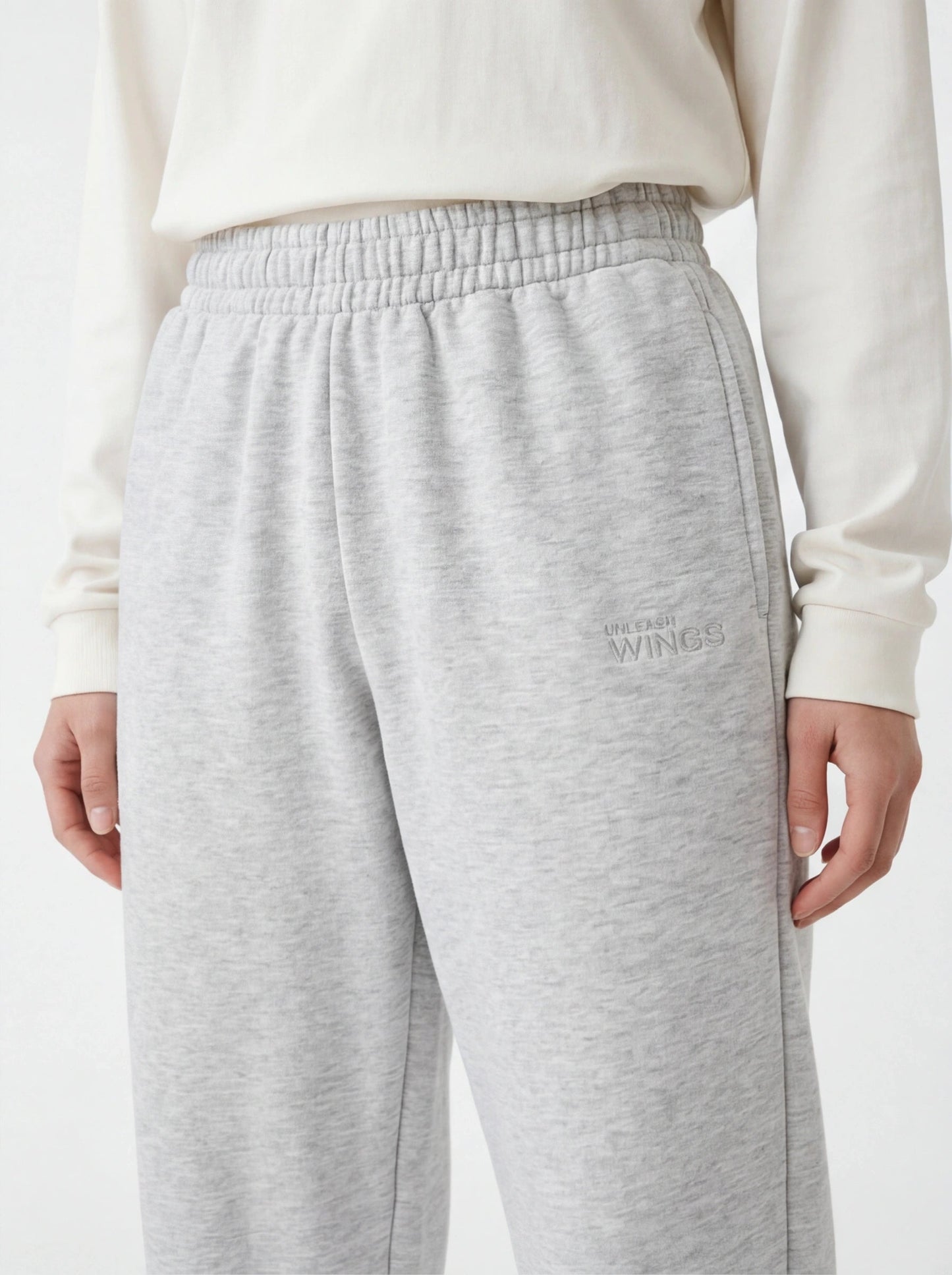 Damskie spodnie dresowe oversize UNLEASH WINGS GREY WINGS UNLEASH