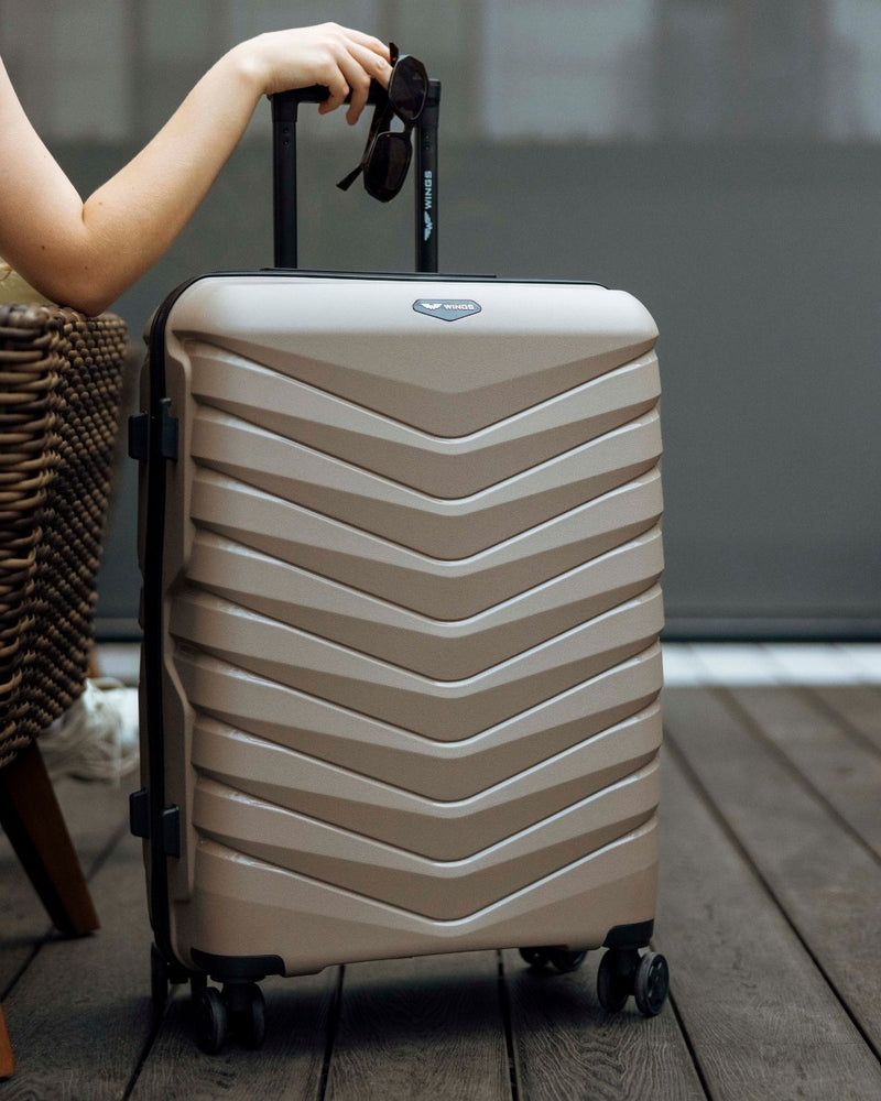 Walizka średnia Wings PHOENIX polipropylen 24" CHAMPAGNE