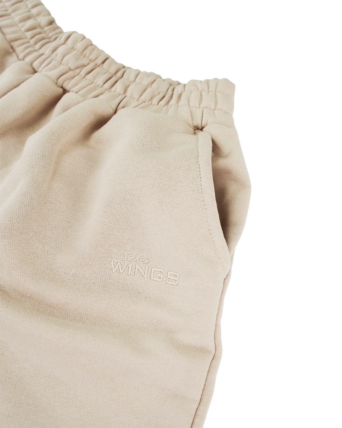 Damskie szorty dresowe UNLEASH WINGS BEIGE
