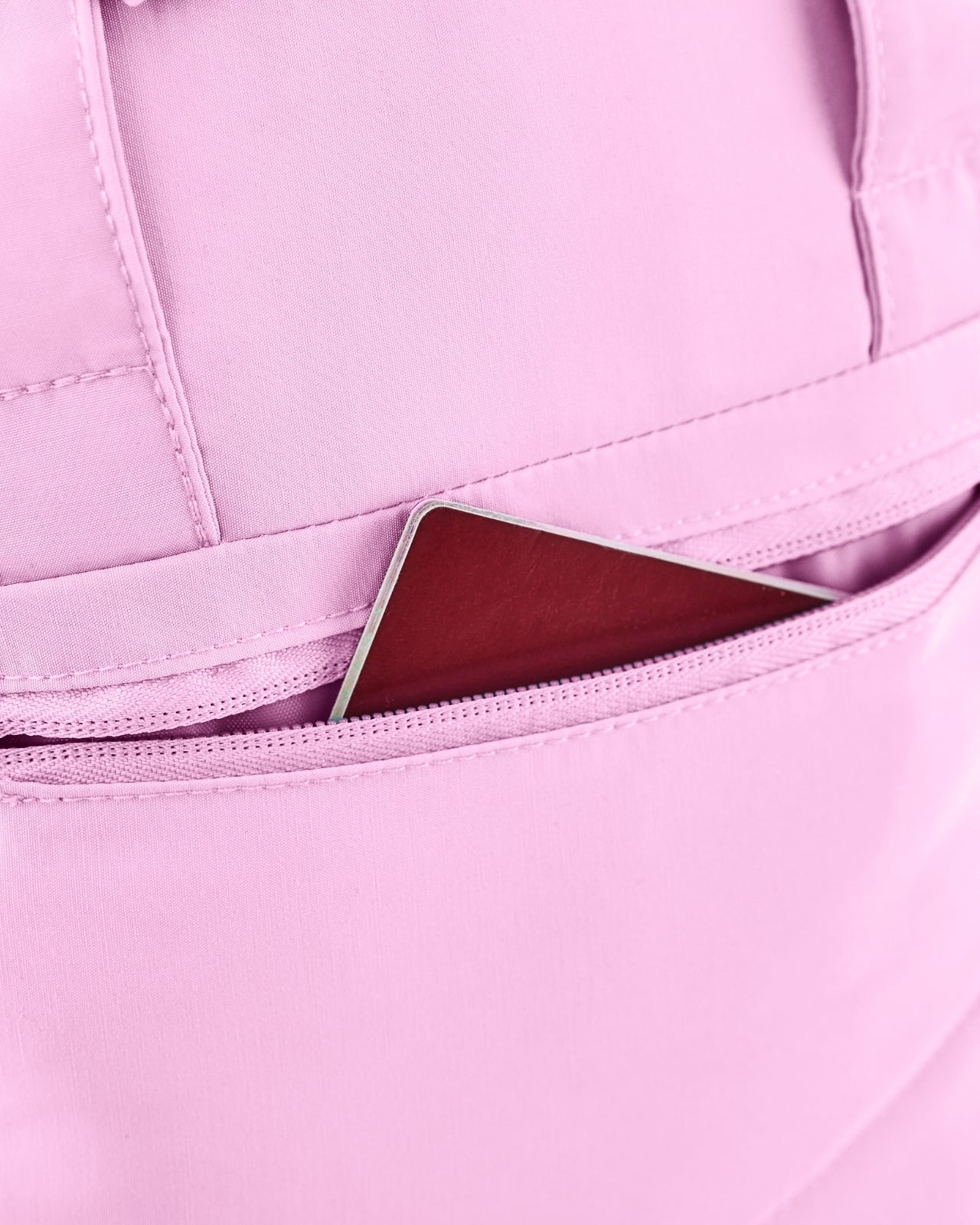 Plecak mały WINGS SOLENNE 12L na laptopa kieszenią frontową PINK