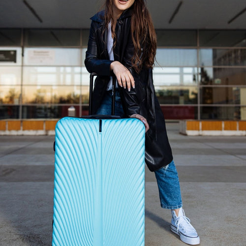 Walizka DUŻA WINGS SWAN 28" LIGHT BLUE