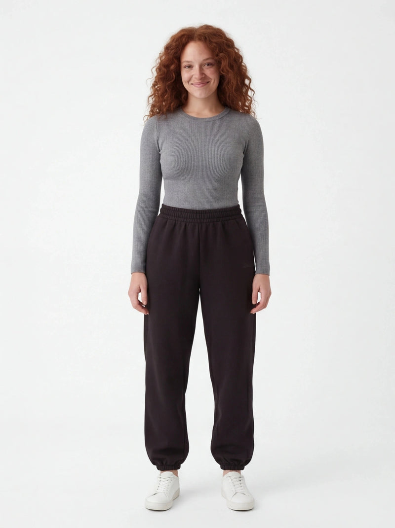 Damskie spodnie dresowe oversize UNLEASH WINGS BLACK