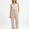 Damskie spodnie dresowe oversize UNLEASH WINGS BEIGE