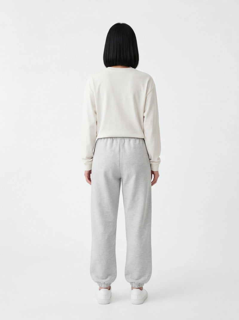 Damskie spodnie dresowe oversize UNLEASH WINGS GREY
