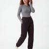 Damskie spodnie dresowe oversize UNLEASH WINGS BLACK