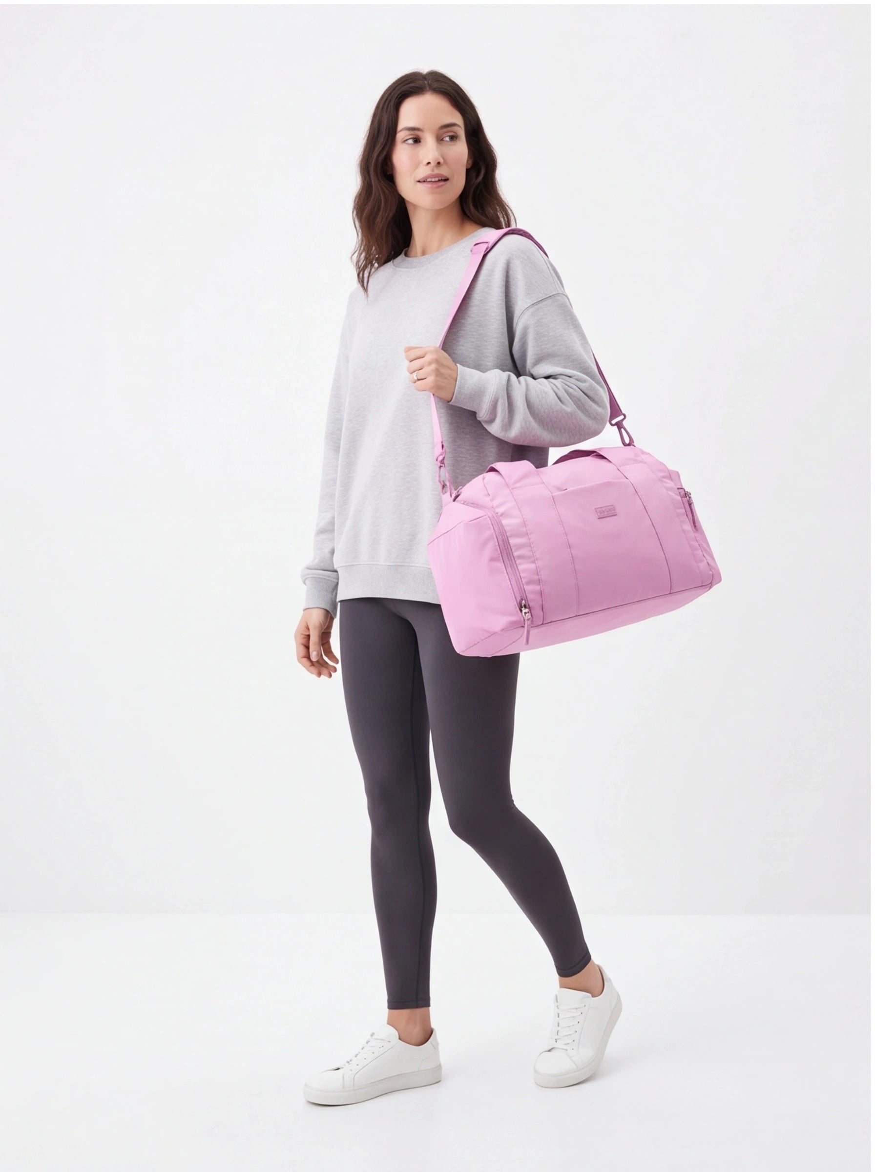 Torba sportowa WINGS SOLENNE z kieszenią na buty i pasem na walizkę PINK