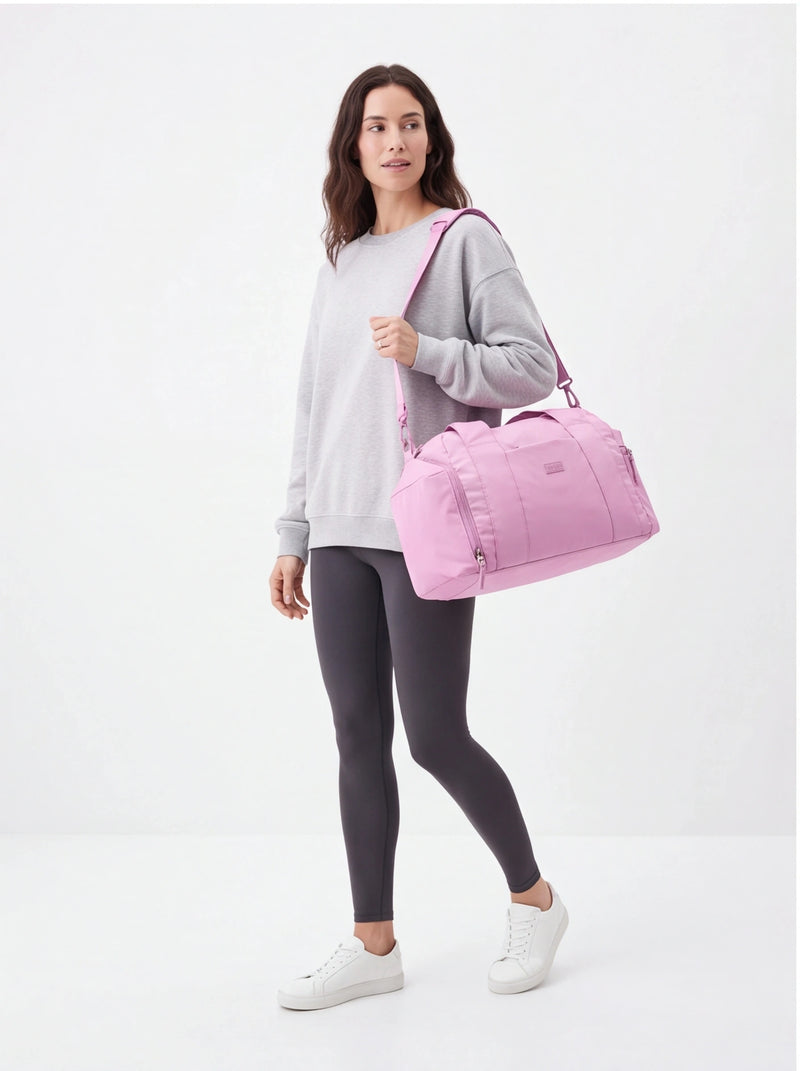 Torba sportowa WINGS SOLENNE z kieszenią na buty i pasem na walizkę PINK