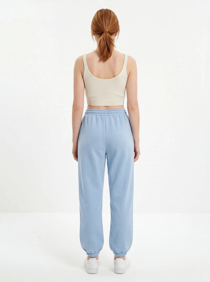 Damskie spodnie dresowe oversize UNLEASH WINGS PASTEL BLUE