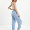 Damskie spodnie dresowe oversize UNLEASH WINGS PASTEL BLUE